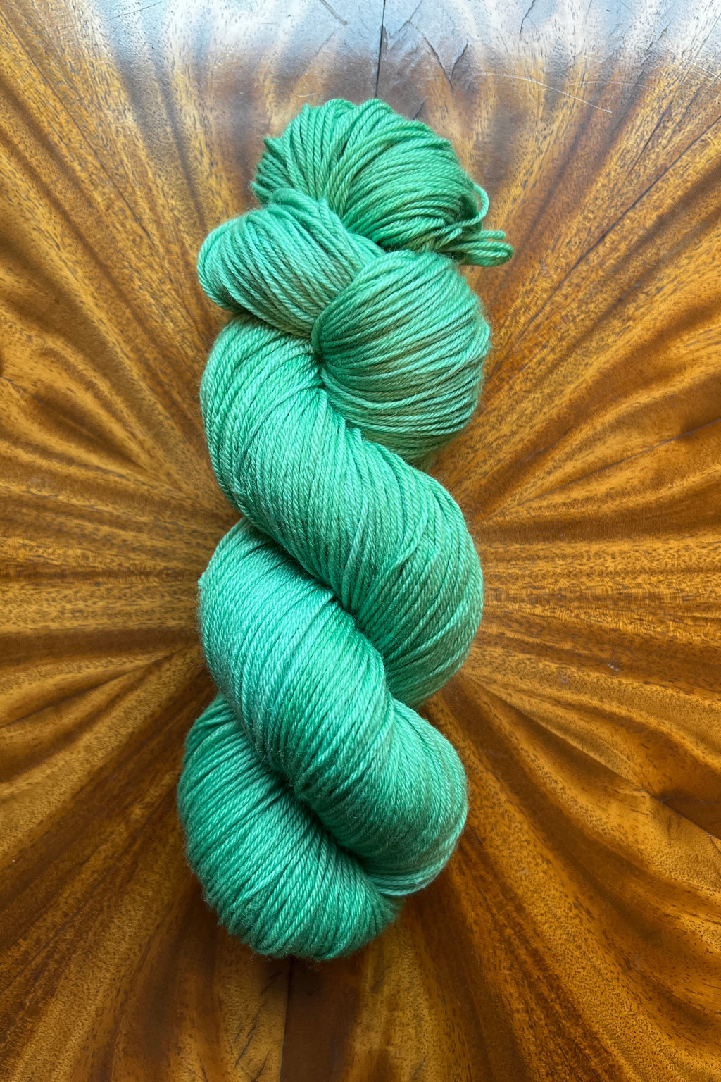 100g skein of Dragon merino hand-dyed in Minneapolis to coordinate with the Masterpiece collection.