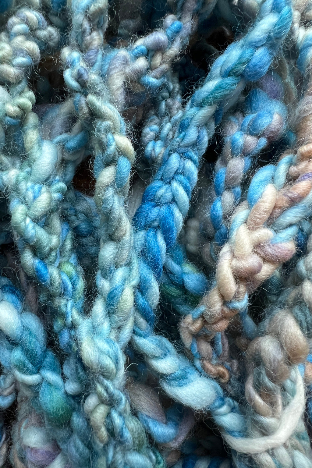 Hand dyed, hand spun, hand crafted crochet trim in blues, taupe, white and lavender. Hand crafted in Minneapolis.