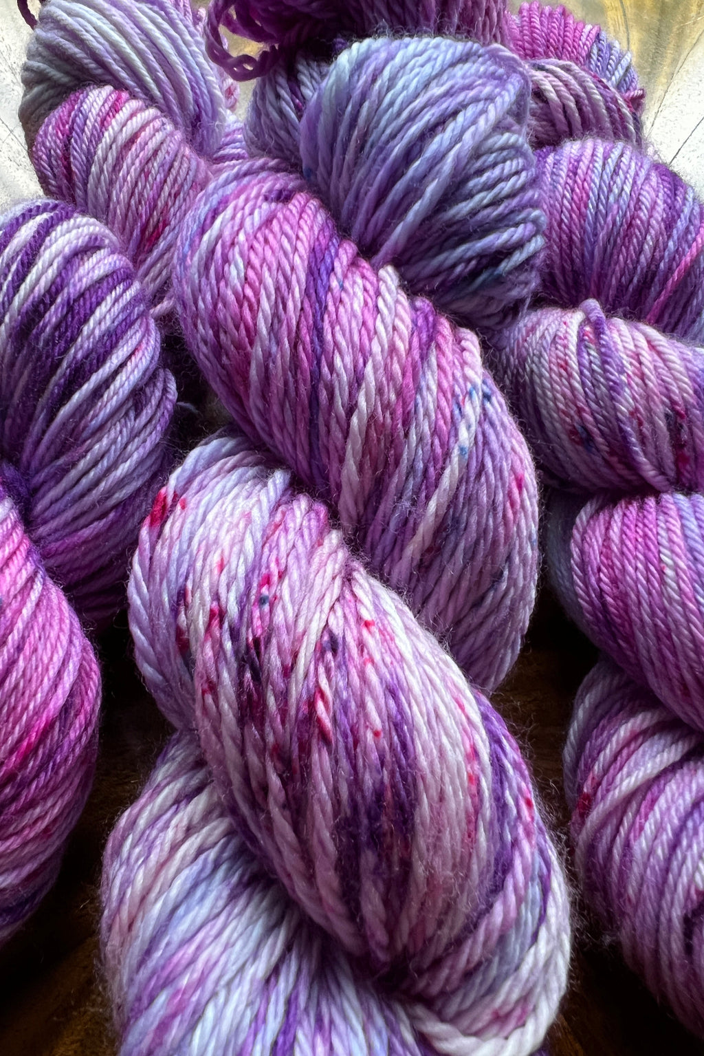 Lose yourself in the lush, dreamy hues of Grape Escape — a hand-dyed  yarn colorway that captures the full spectrum of the vineyard at dusk.