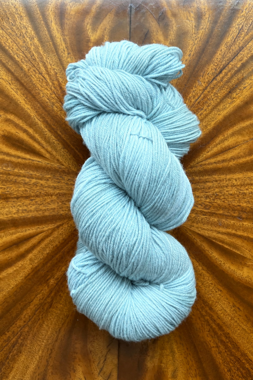 Hand dyed in Minneapolis by Painted Skein, Frosted Blue Mernio yarn. Mix and Match with Masterpiece collection.