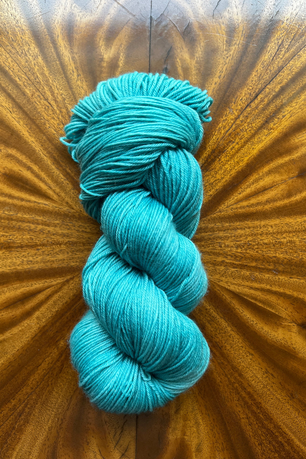 Hand dyed in Minneapolis to mix with Masterpiece collection Teal 100g merino yarn.