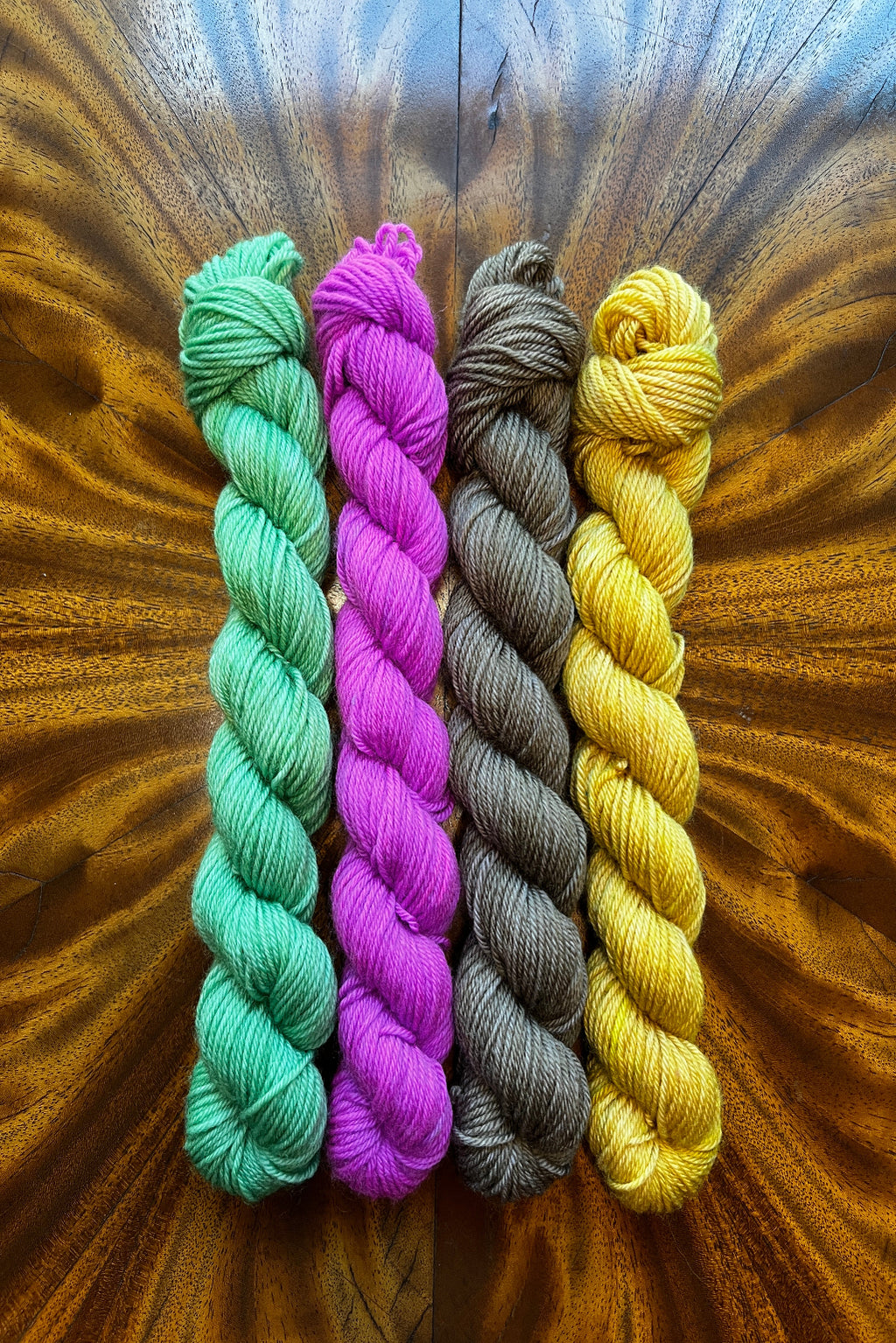 Hand-dyed by Minnesota indie dyer. Four 20-gram mini skeins of merino tonal yarn in coordinating colors inspired by Kilmt's The Virgin created for the Masterpiece Collection.
