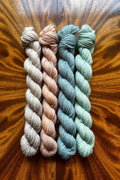 Palette Studies mini skein set with four coordinating tonal yarn colors for Dancer in Pink colorwork projects.