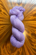 Hand dyed in Minneapolis, Lavender 100g skein of merino yarn. Coordinates with Masterpiece collection.
