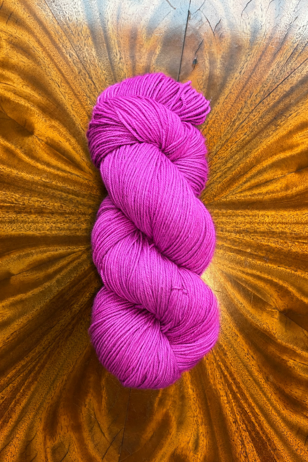 100g skein of Purple Pop merino yarn, hand dyed in Minneapolis to coordinate with the Masterpiece collection.