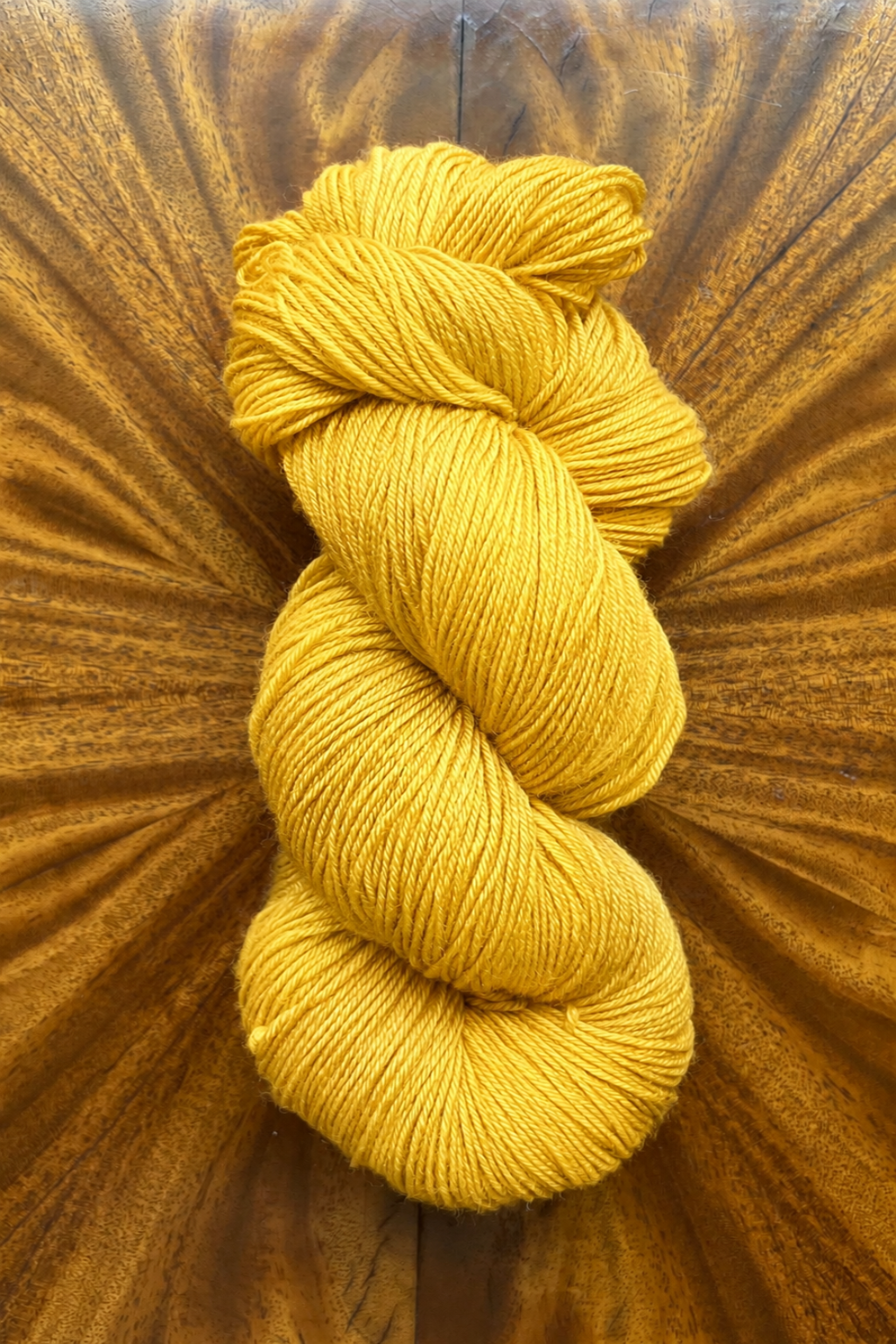 Tobacco merino yarn hand-dyed in Minneapolis by Painted Skein to coordinate with Masterpiece collection.