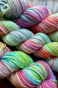 three skeins of unicorns & rainbows yarn hand dyed in Minneapolis as seen on YOutube.